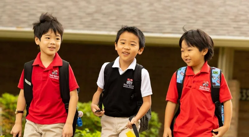 3 students walking together