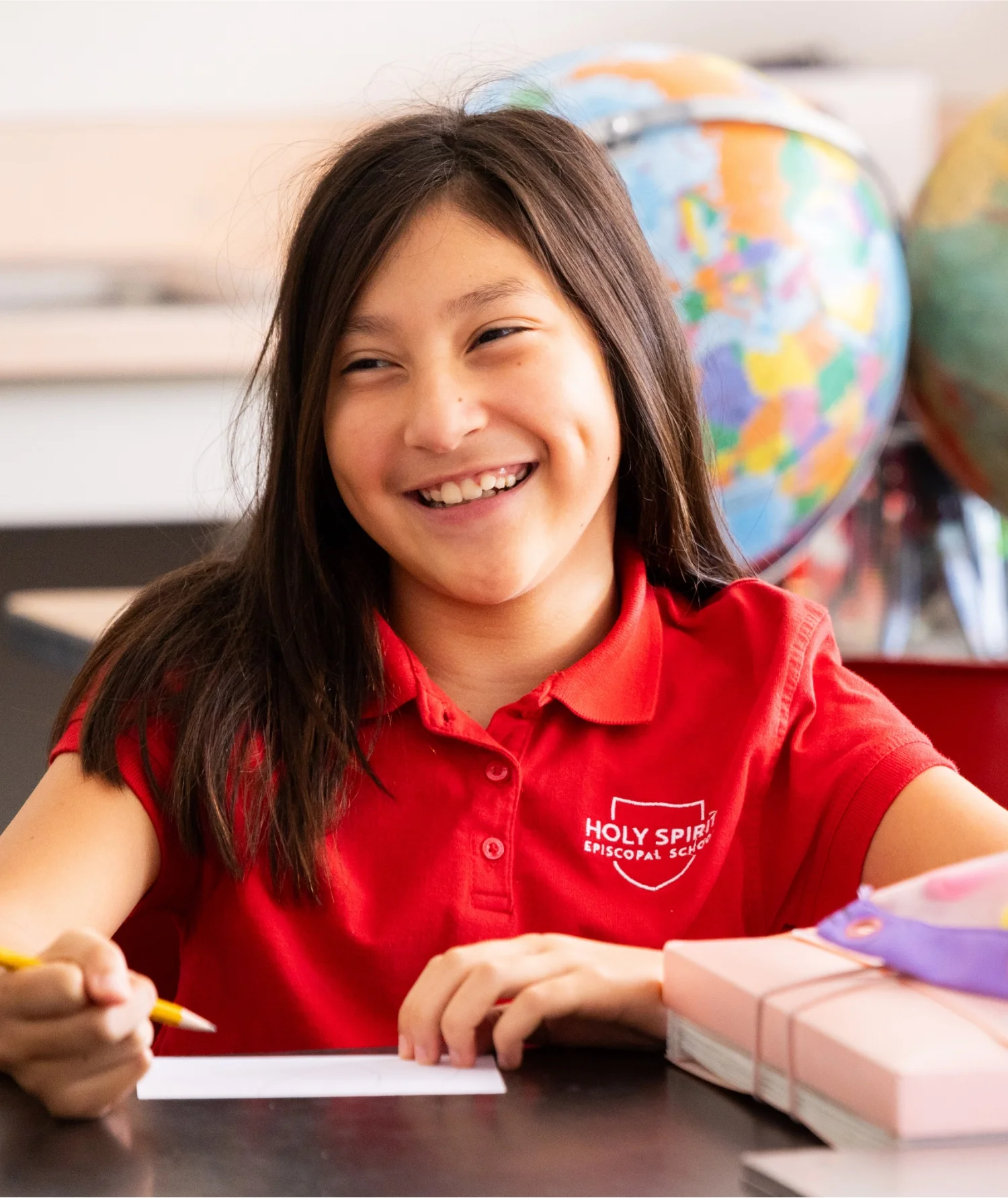 lower school student smiling