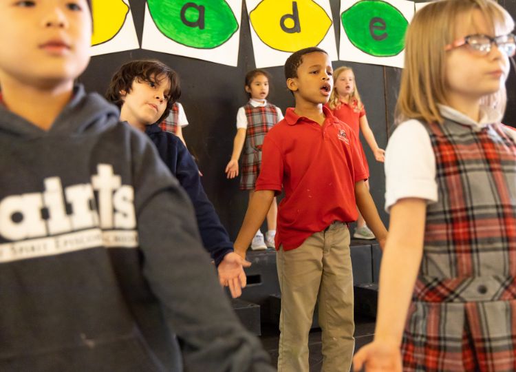 A group of students acting in a school play